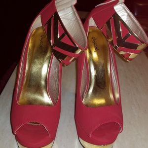 Red and gold heels size 11